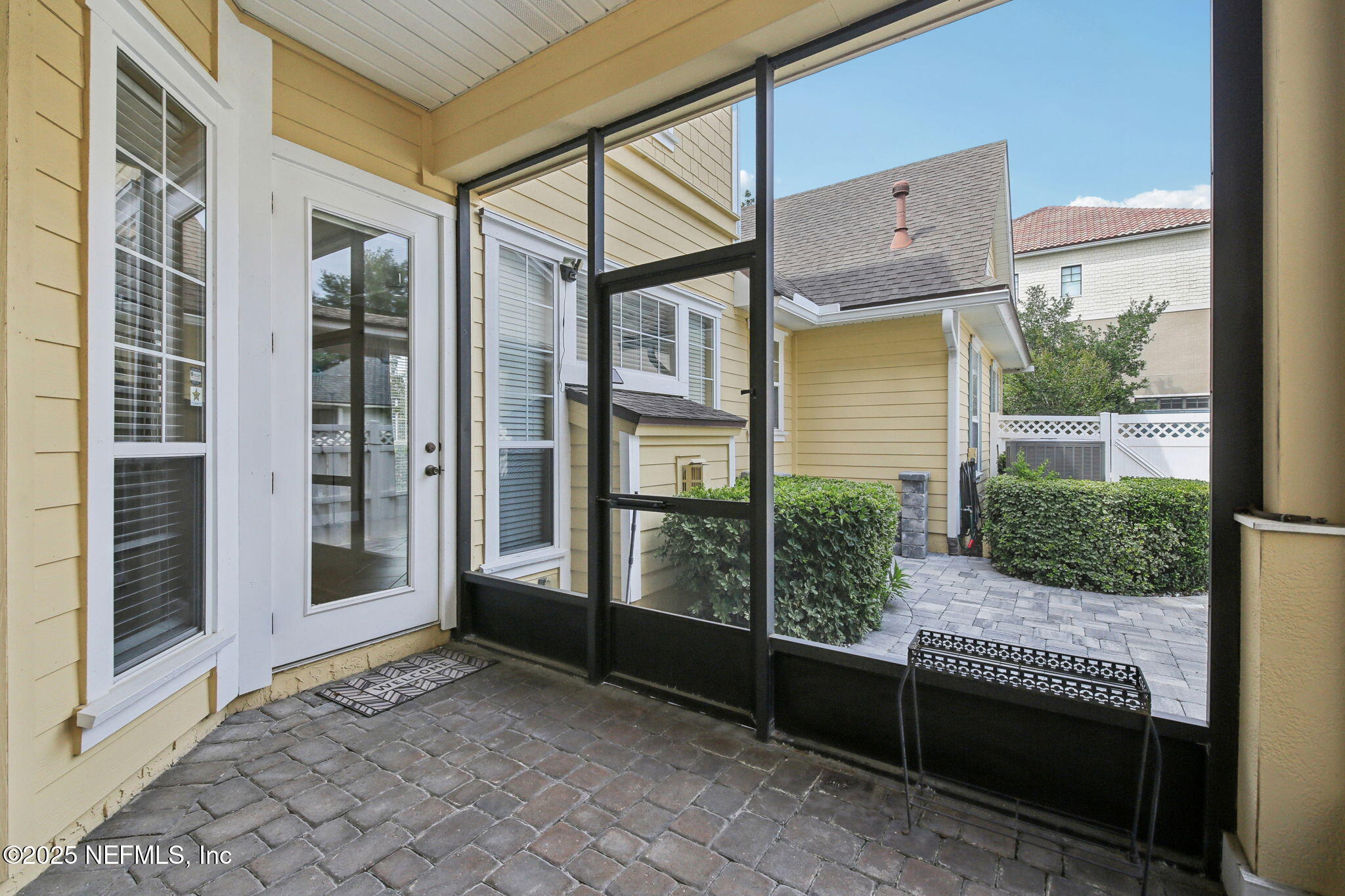 400 Central Street St. Augustine, FL 32095 - Photo 42 of 49 a view of a house with a large window and wooden fence