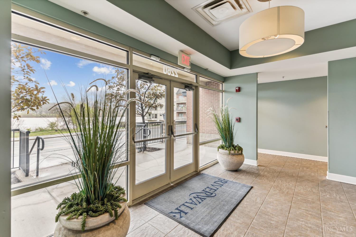2260 Riverside Drive, Unit 205 Cincinnati, OH 45202 - Photo 4 of 37 The designer entry features glass entry and window walls overlooking Le Blonde Park and the majestic Ohio River...