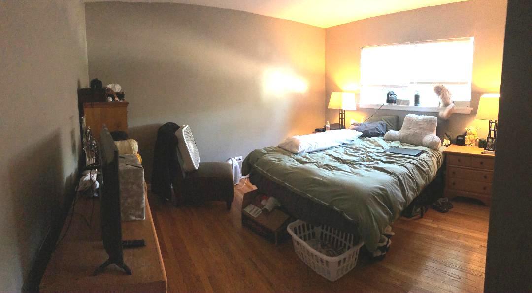 609 Oakton Street, Unit 2D Evanston, IL 60202 - Photo 6 of 7 a bedroom with a bed and a window