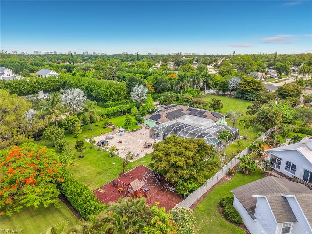 2280 Capri Court Naples, FL 34105 - Photo 2 of 49 a view of a yard with an ocean