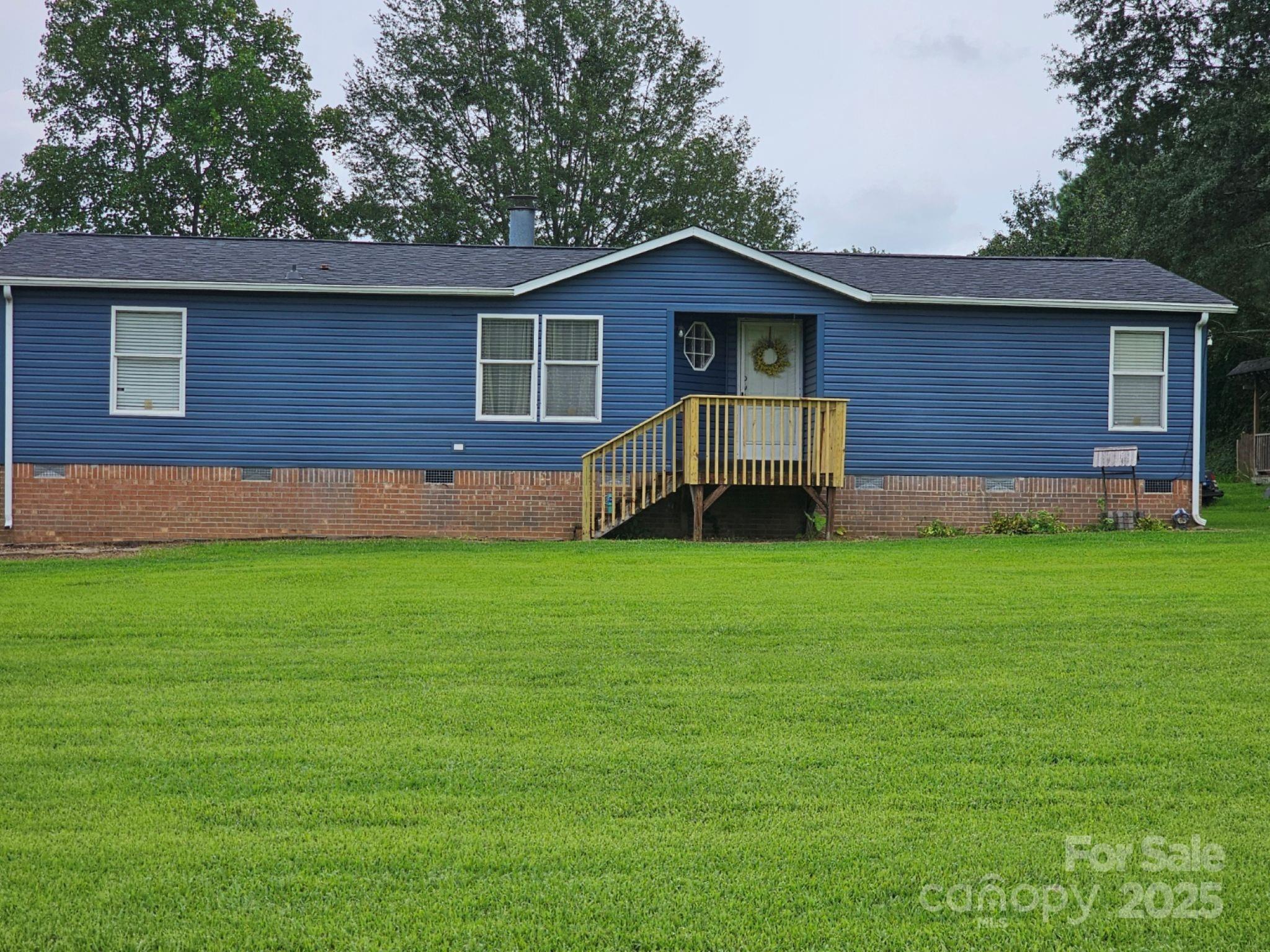 a view of a backyard with a garden