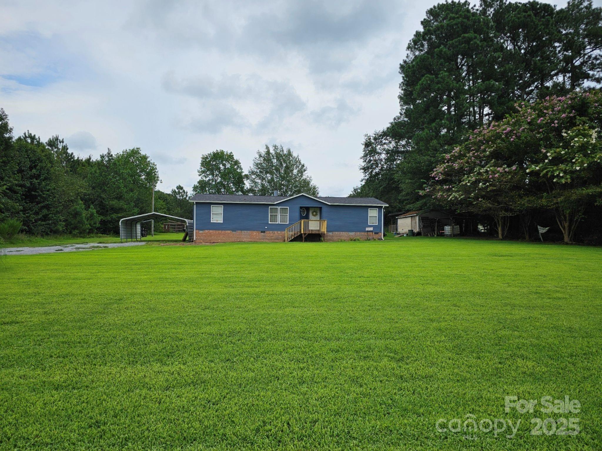 434 Howard Lingerfelt Road Vale, NC 28168 - Photo 12 of 13 a view of a house with a back yard