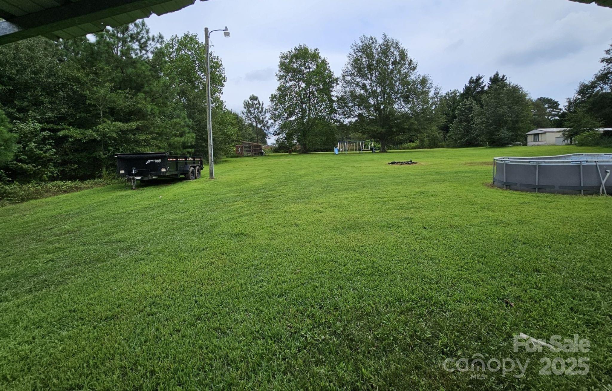 434 Howard Lingerfelt Road Vale, NC 28168 - Photo 13 of 13 a view of a garden with houses