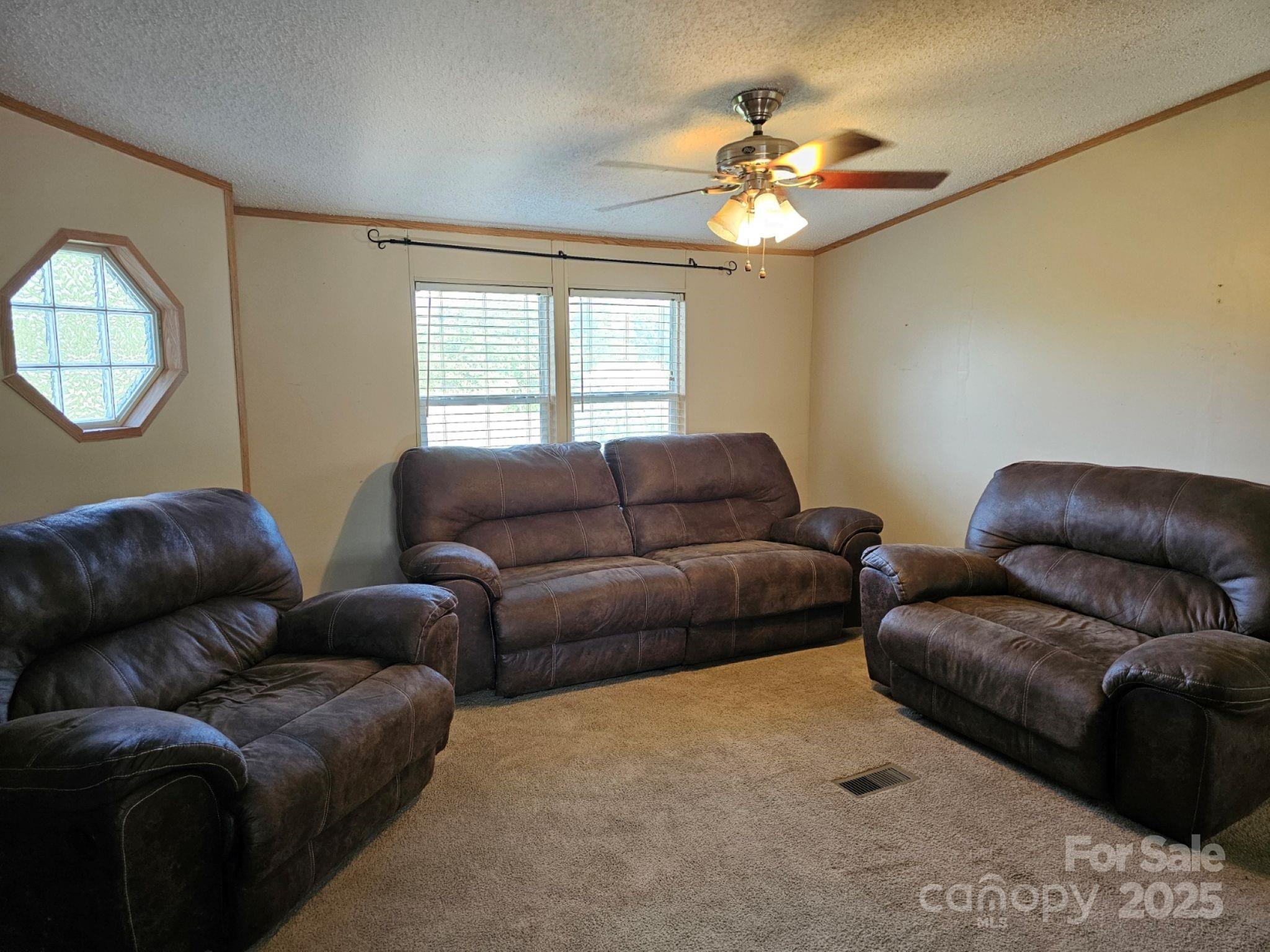 434 Howard Lingerfelt Road Vale, NC 28168 - Photo 4 of 13 a living room with furniture and a large window
