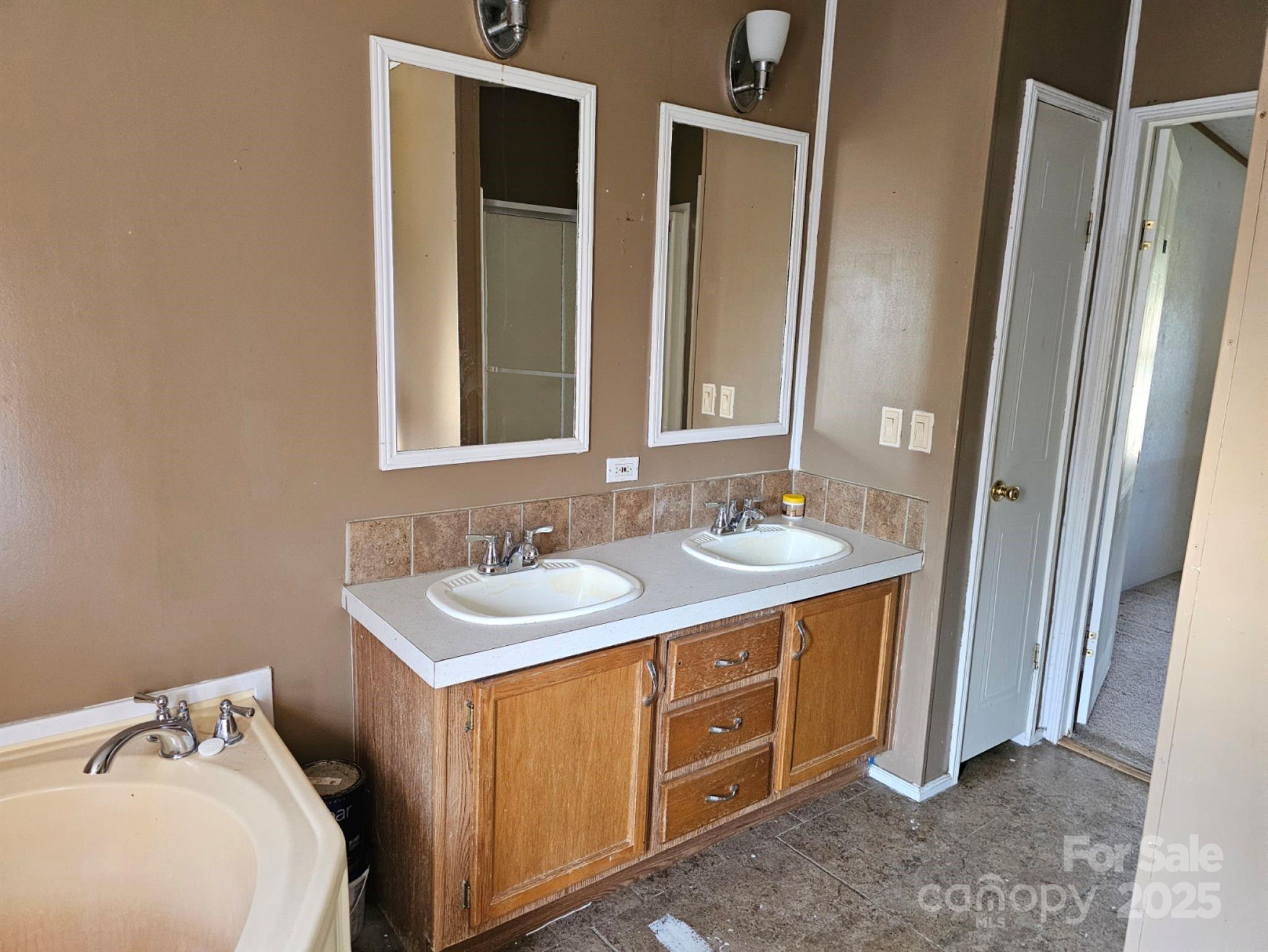 434 Howard Lingerfelt Road Vale, NC 28168 - Photo 7 of 13 a bathroom with a sink and a mirror