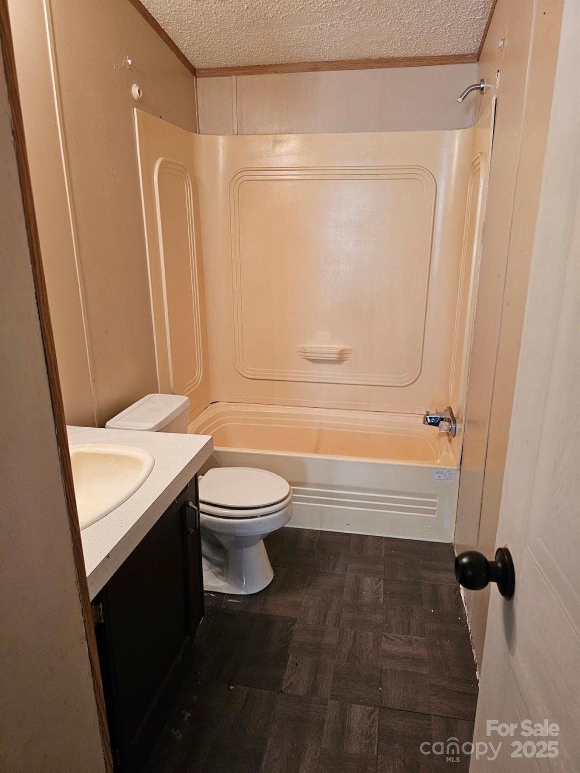 434 Howard Lingerfelt Road Vale, NC 28168 - Photo 10 of 13 a bathroom with a toilet a sink and shower