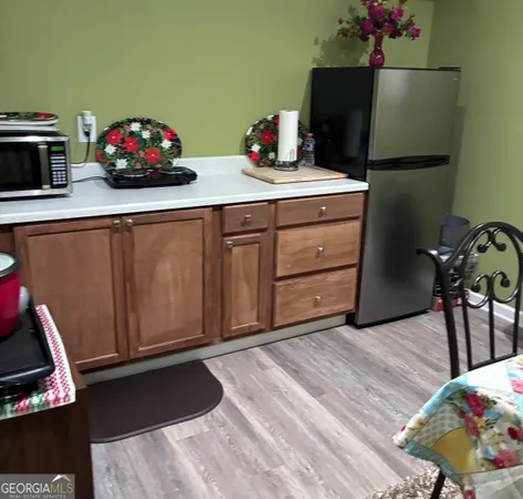 a bedroom with a bed and a tv