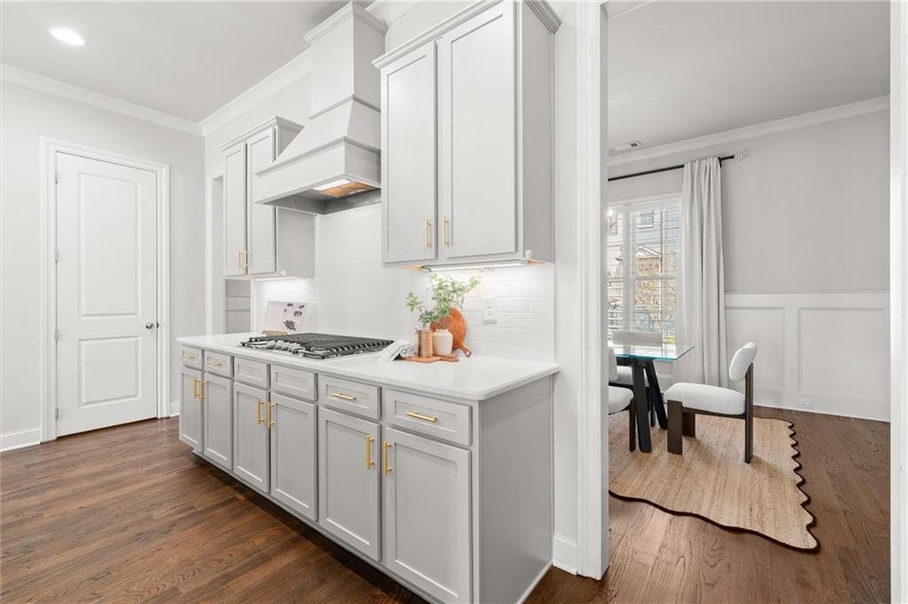 1868 Skyfall Circle Atlanta, GA 30319 - Photo 11 of 61 a kitchen with stainless steel appliances granite countertop a stove and a refrigerator