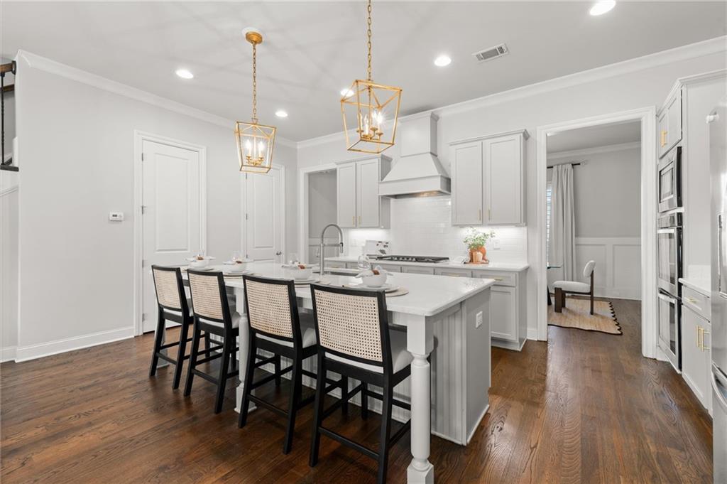 1868 Skyfall Circle Atlanta, GA 30319 - Photo 15 of 61 a large kitchen with a table and chairs