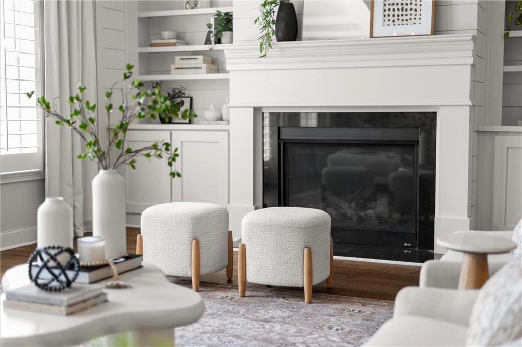 1868 Skyfall Circle Atlanta, GA 30319 - Photo 24 of 61 a living room with furniture and a fireplace
