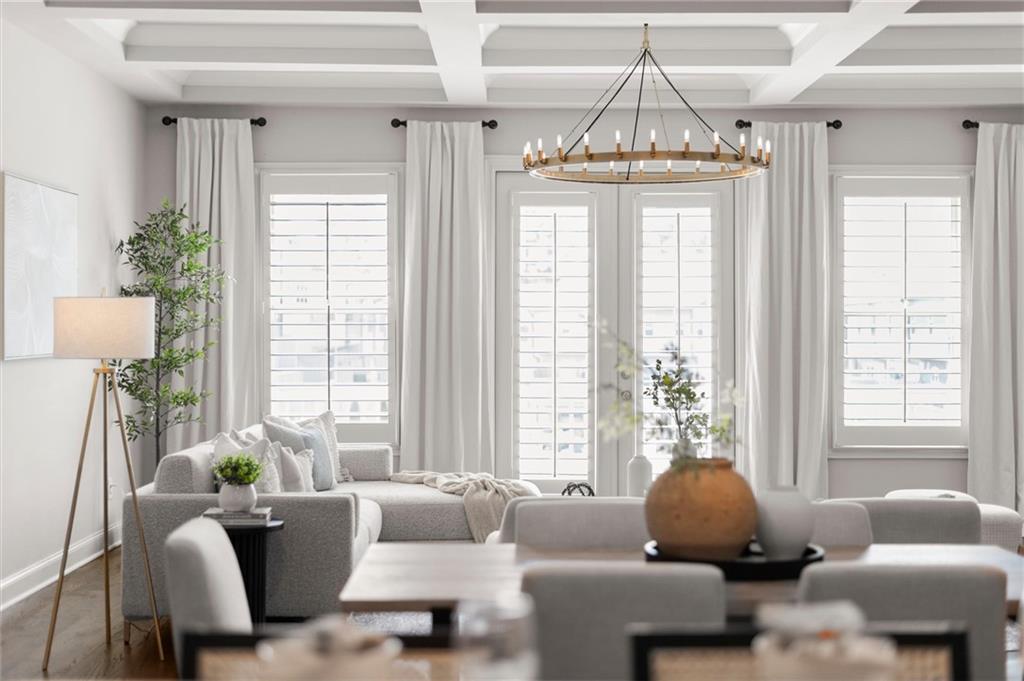 1868 Skyfall Circle Atlanta, GA 30319 - Photo 25 of 61 a living room with furniture and a chandelier