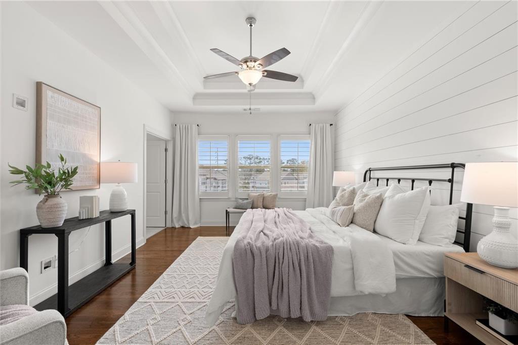 1868 Skyfall Circle Atlanta, GA 30319 - Photo 32 of 61 a bedroom with a large bed and a window