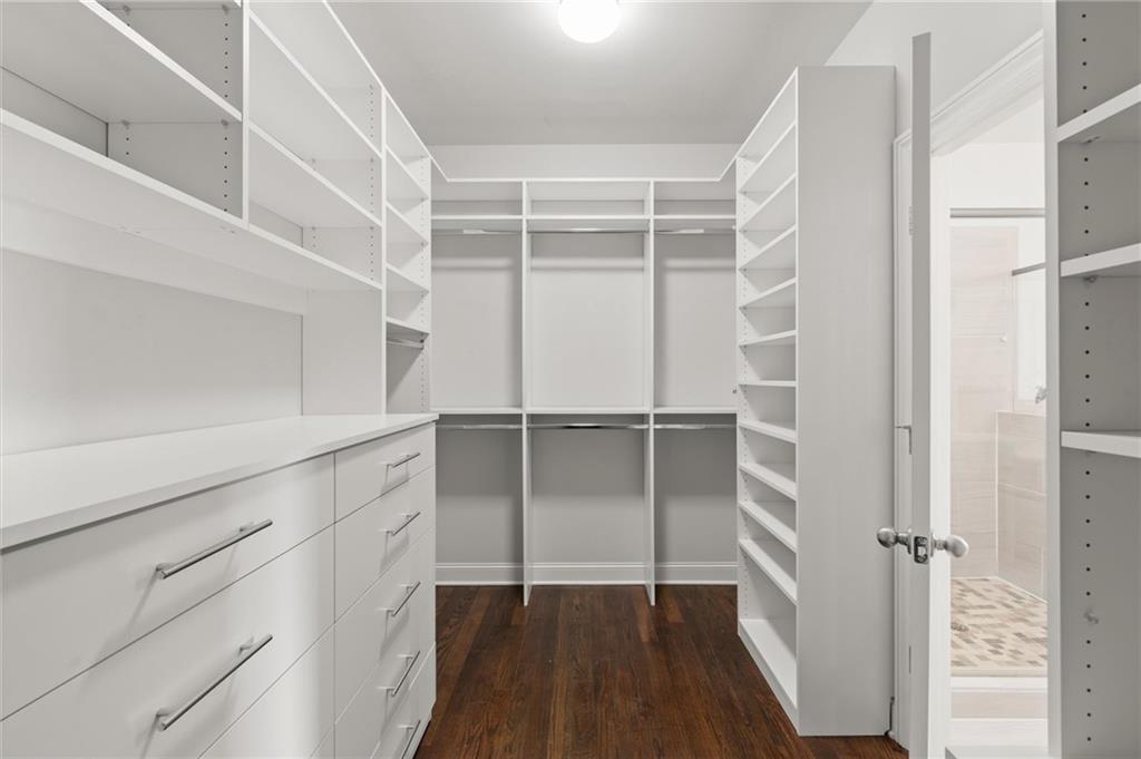 1868 Skyfall Circle Atlanta, GA 30319 - Photo 40 of 61 a view of walk in closet with empty racks