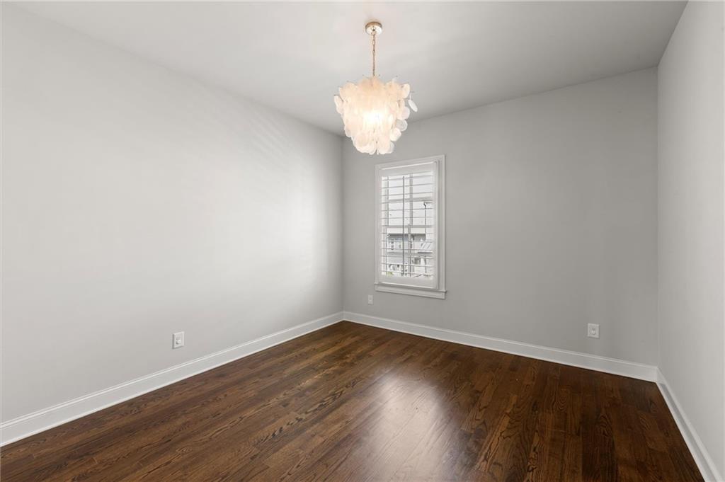 1868 Skyfall Circle Atlanta, GA 30319 - Photo 42 of 61 a view of a room with wooden floor and a window