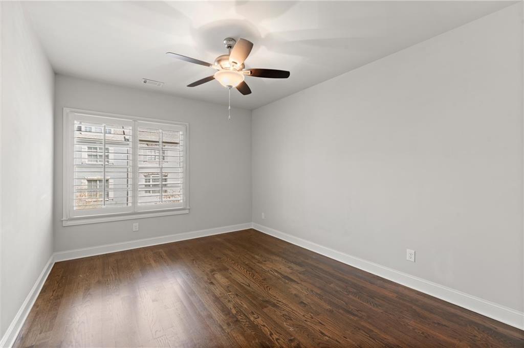 1868 Skyfall Circle Atlanta, GA 30319 - Photo 43 of 61 wooden floor in an empty room with a window
