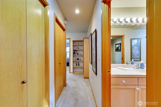 a view of a bedroom from a hallway