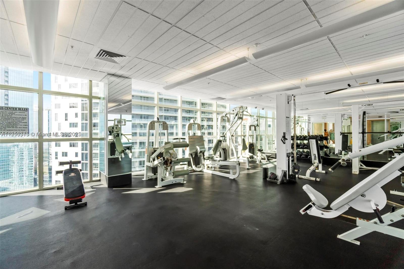 218 Southeast 14th Street, Unit 1003 Miami, FL 33131 - Photo 27 of 27 a view of a room with gym equipment