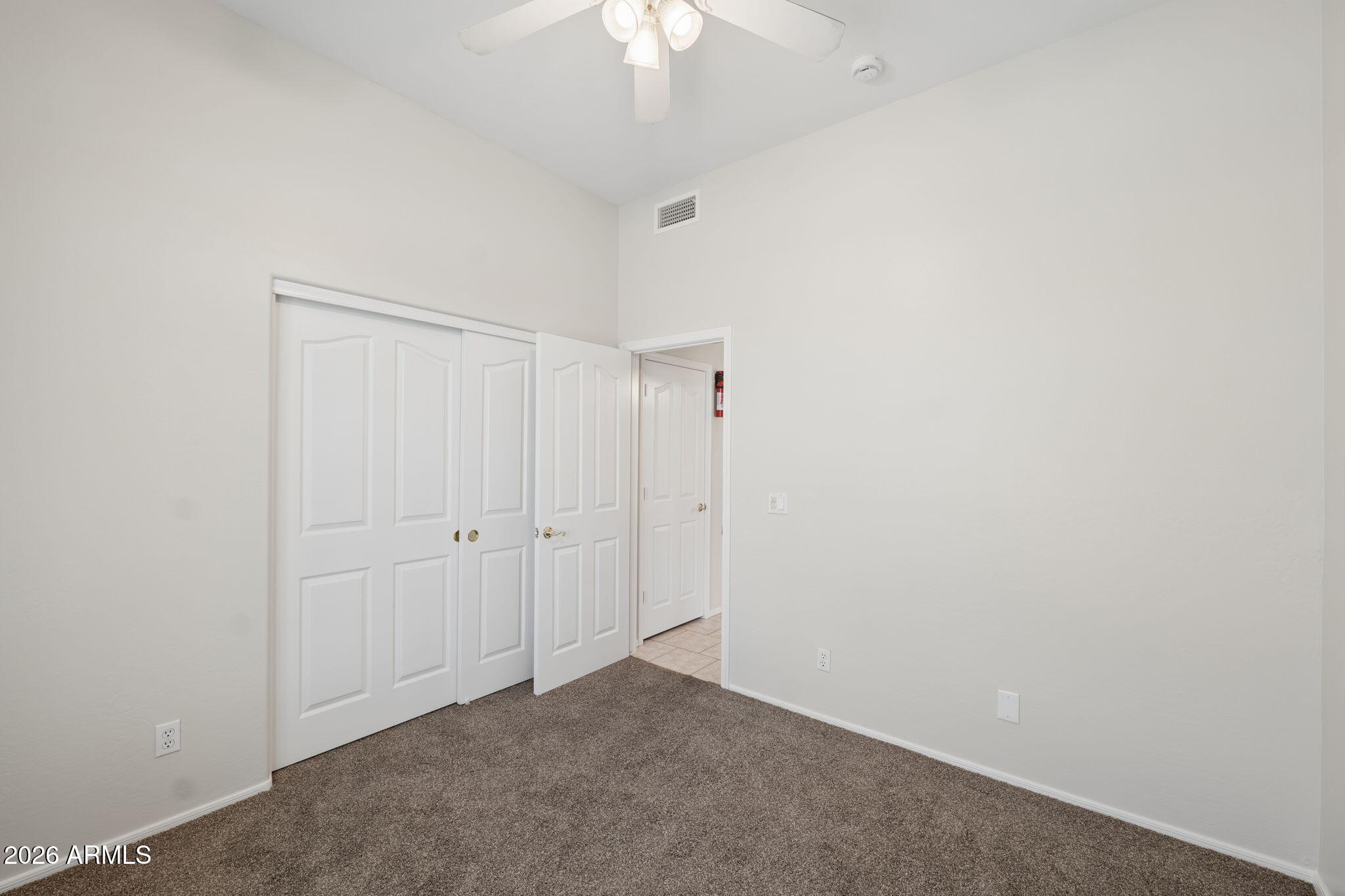 4418 East Jaeger Road Phoenix, AZ 85050 - Photo 30 of 42 28 - Bedroom3 to hallway