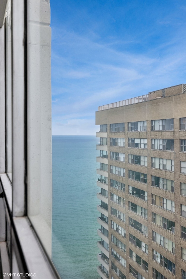 6171 North Sheridan Road, Unit 2404 Chicago, IL 60660 - Photo 21 of 30 a view of balcony with wooden floor