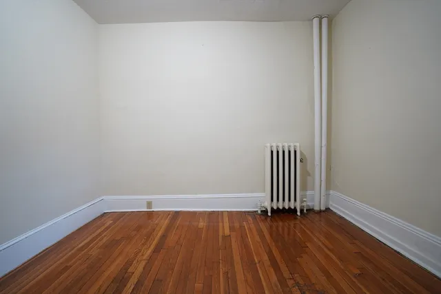 a view of wooden floor and wooden floor in a room