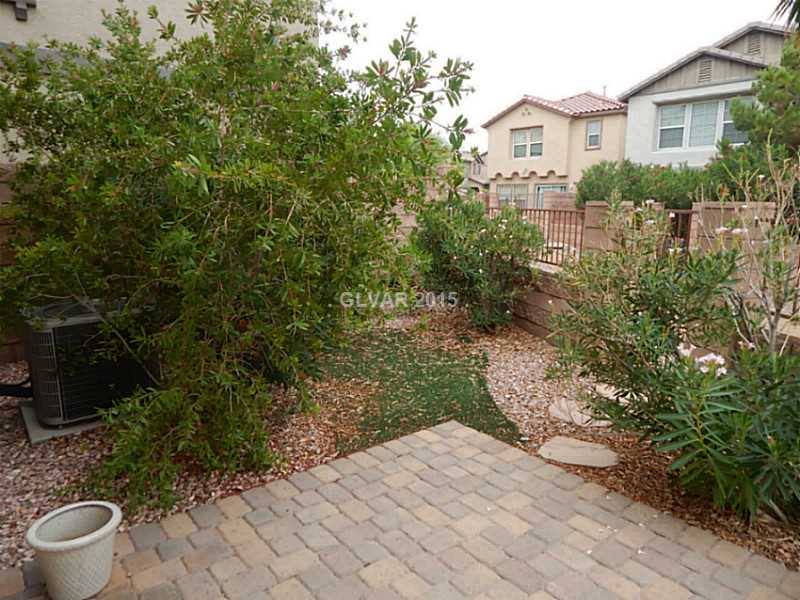 1165 Paradise River Road Henderson, NV 89002 - Photo 16 of 35 Property Photo. Backyard patio w/gate to the community walking trails.