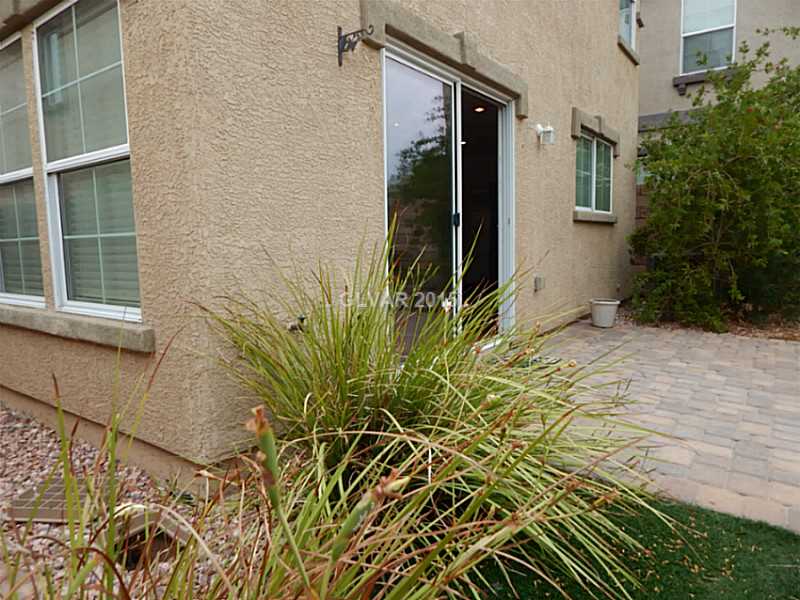 1165 Paradise River Road Henderson, NV 89002 - Photo 17 of 35 Property Photo. Rear yard with brick paver patio.