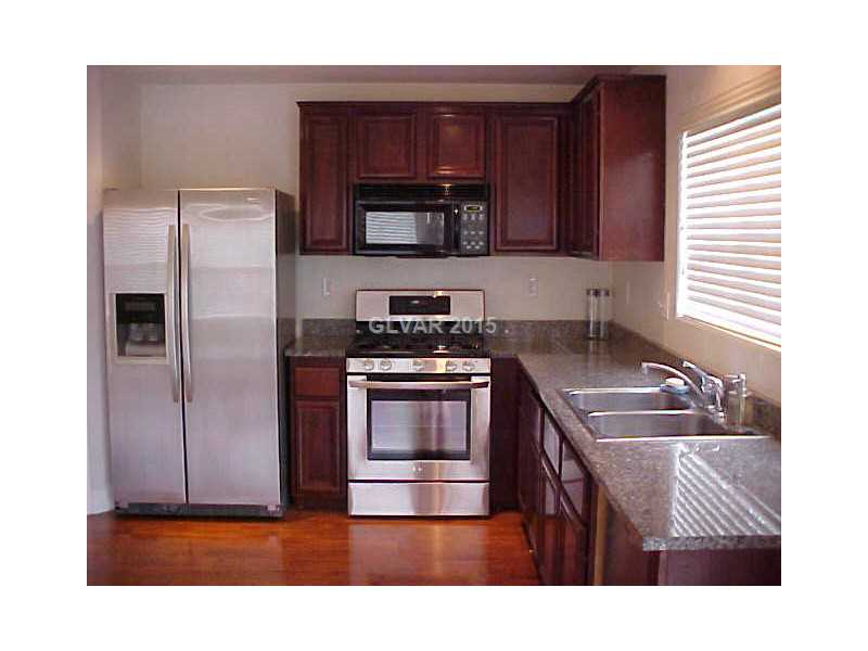 1165 Paradise River Road Henderson, NV 89002 - Photo 8 of 35 Property Photo. Granite countertops & beautiful cabinetry.