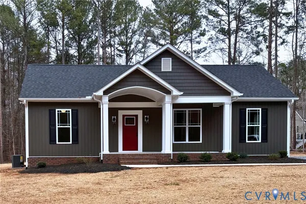 a front view of a house with yard