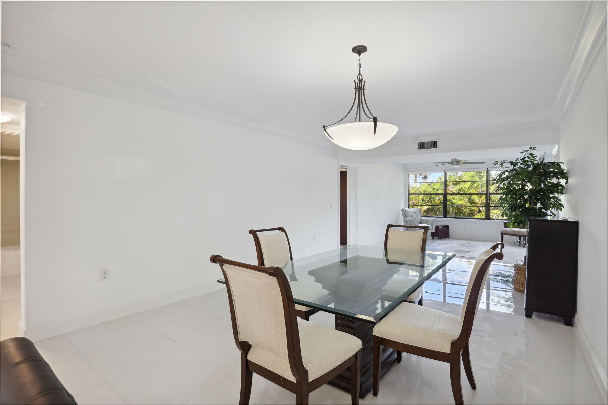 6073 Balboa Circle, Unit 201 Boca Raton, FL 33433 - Photo 13 of 40 Dining to Living room