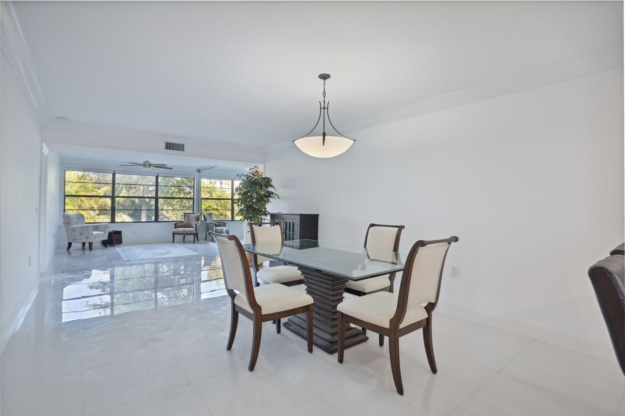 6073 Balboa Circle, Unit 201 Boca Raton, FL 33433 - Photo 19 of 40 Dining to Living room