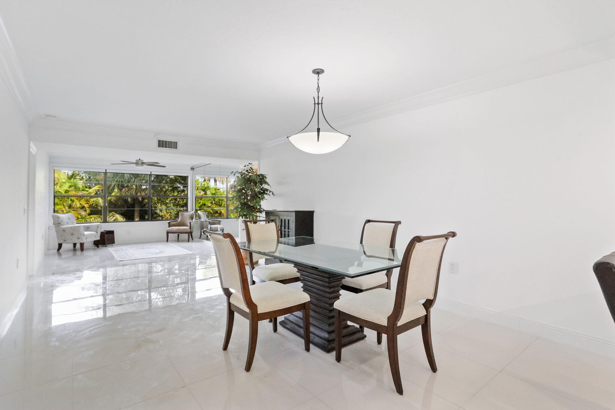 6073 Balboa Circle, Unit 201 Boca Raton, FL 33433 - Photo 32 of 40 Dining to Living