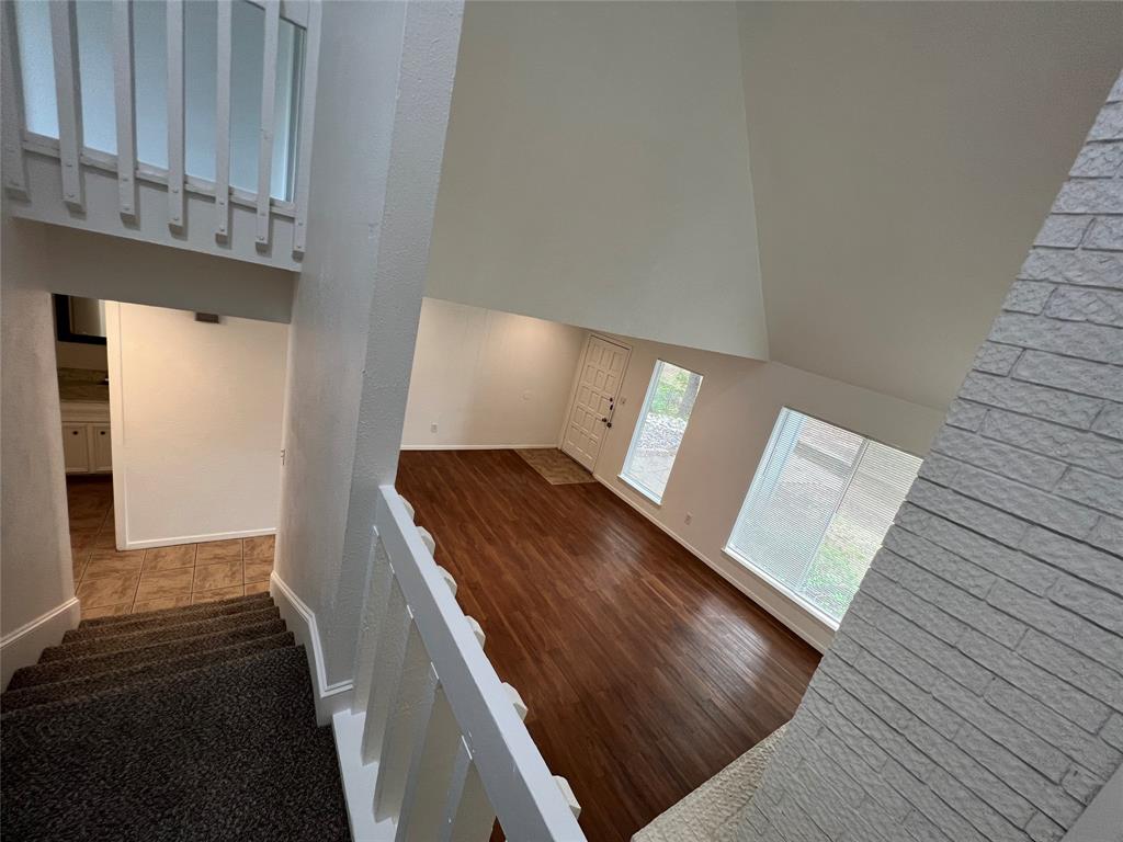 1908 Camden Court, Unit 3 Denton, TX 76205 - Photo 10 of 17 Stairwell up to bedrooms.