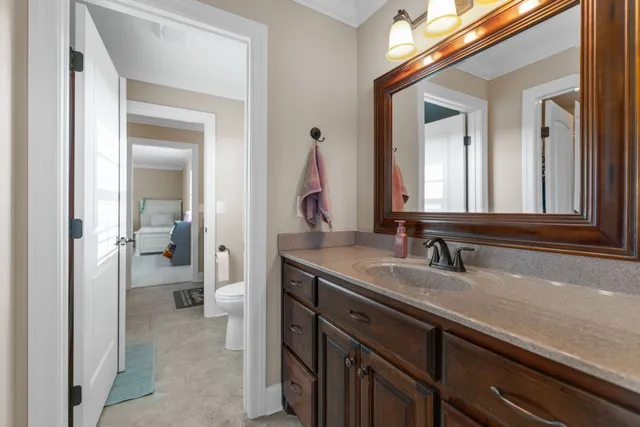 a view of a patio with a table chairs and a backyard