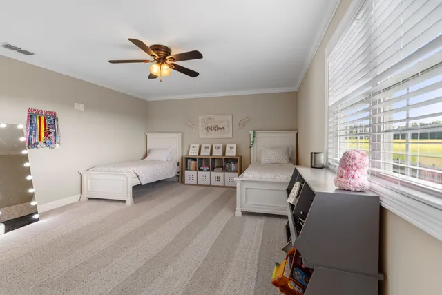 a view of a outdoor space with a garden and entertaining space