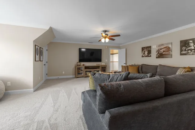 a front view of a house with a yard table and chairs