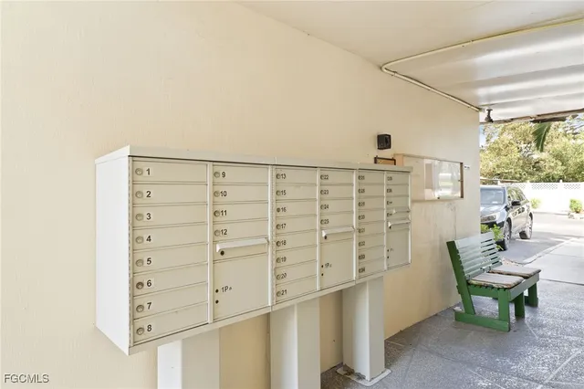 a view of a hallway with seating area