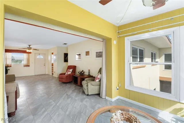 a bed room with a bed and a window