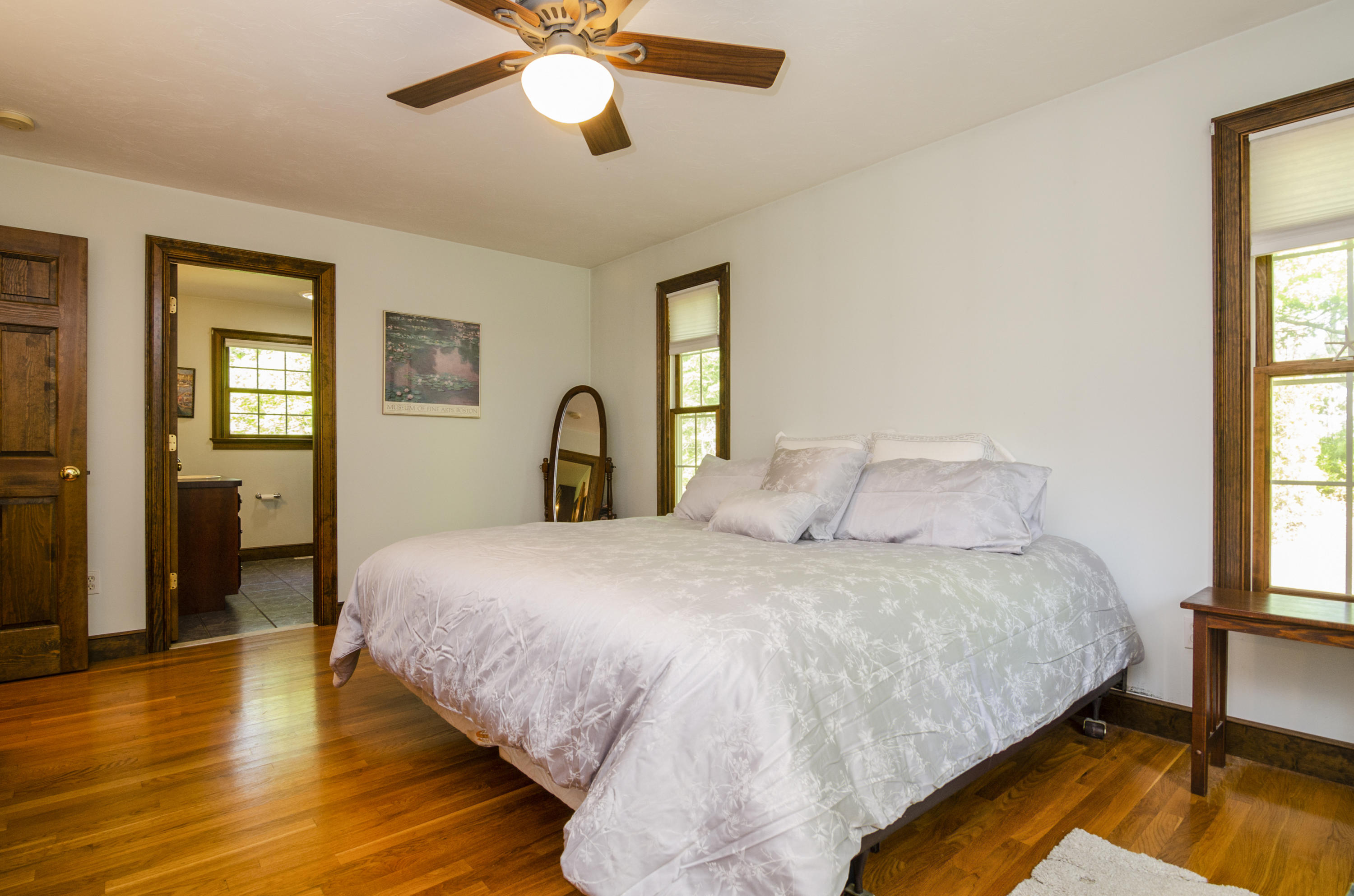 50 Waterhouse Road Bourne, MA 02532 - Photo 14 of 25 a bedroom with bed and window