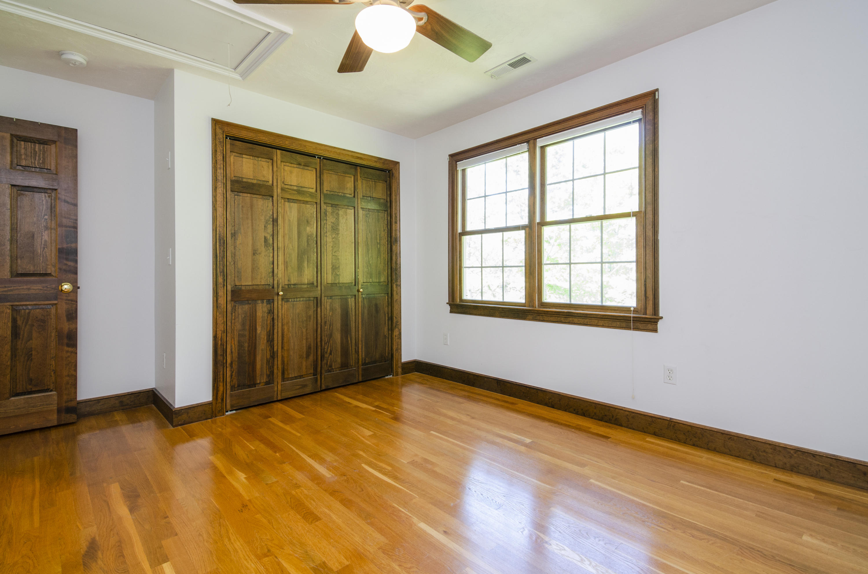 50 Waterhouse Road Bourne, MA 02532 - Photo 18 of 25 a view of an empty room with a window