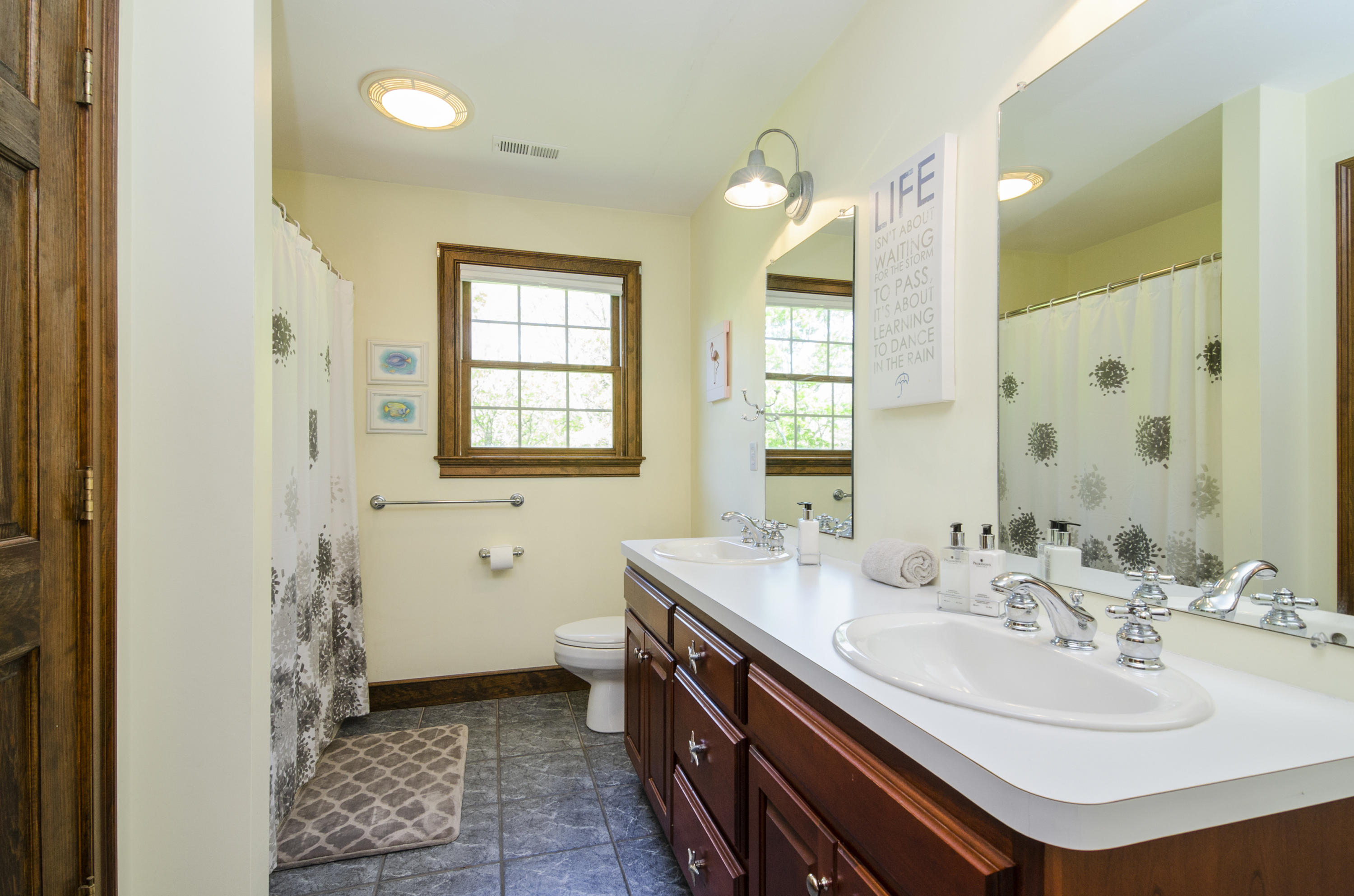 50 Waterhouse Road Bourne, MA 02532 - Photo 21 of 25 a bathroom with a sink and a mirror