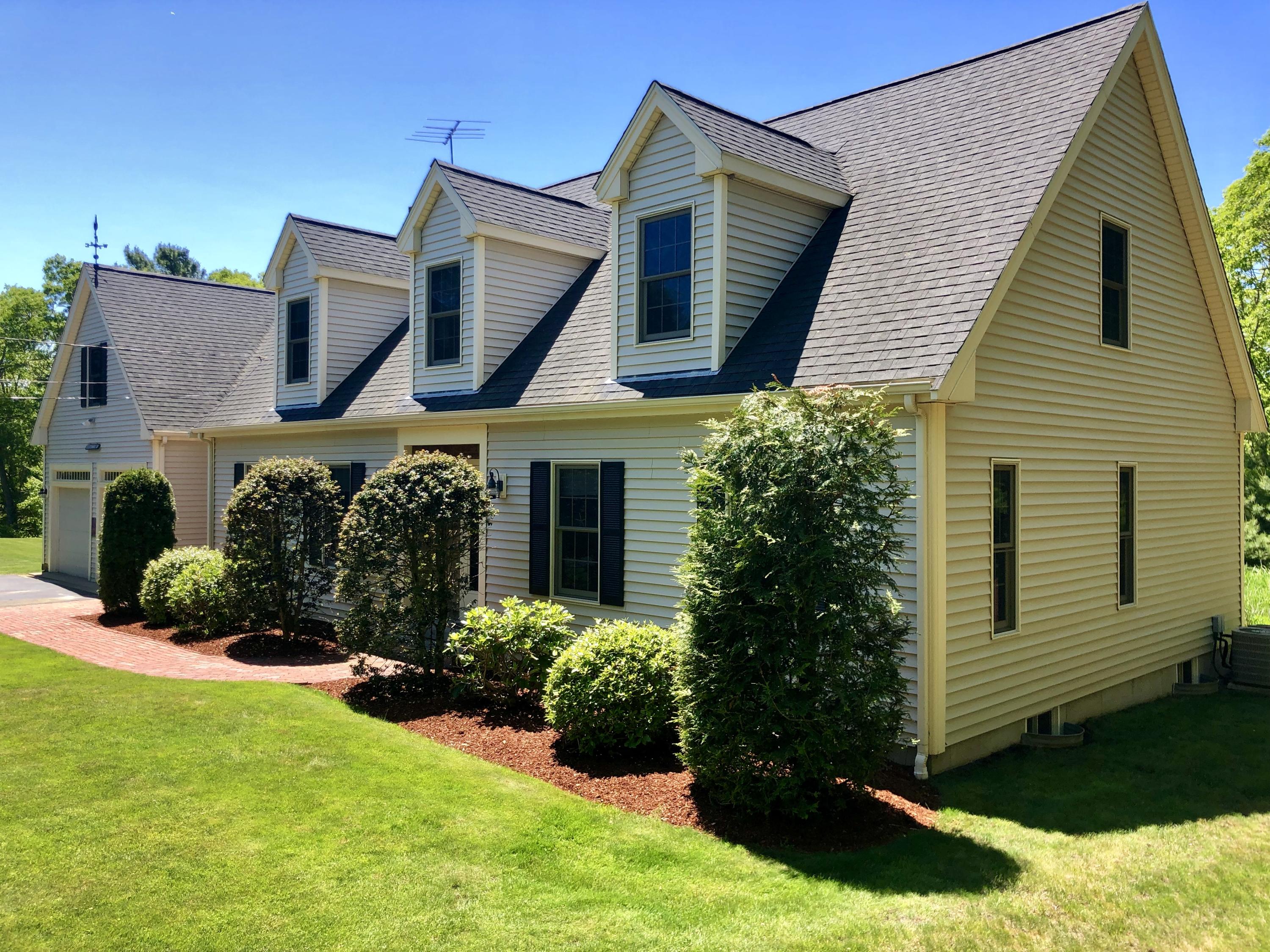 50 Waterhouse Road Bourne, MA 02532 - Photo 3 of 25 a front view of a house with a yard
