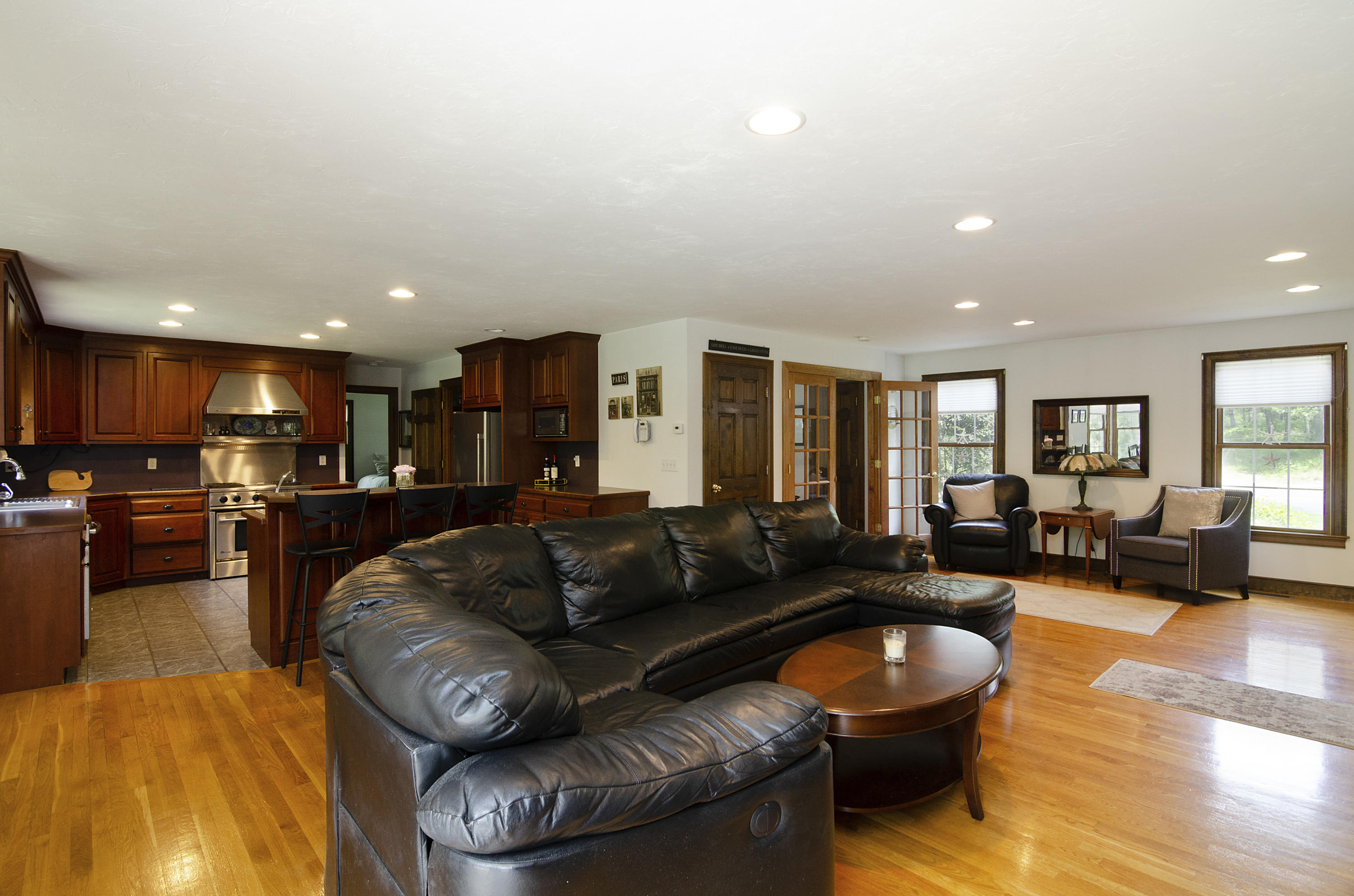 50 Waterhouse Road Bourne, MA 02532 - Photo 5 of 25 a living room with furniture and a wooden floor