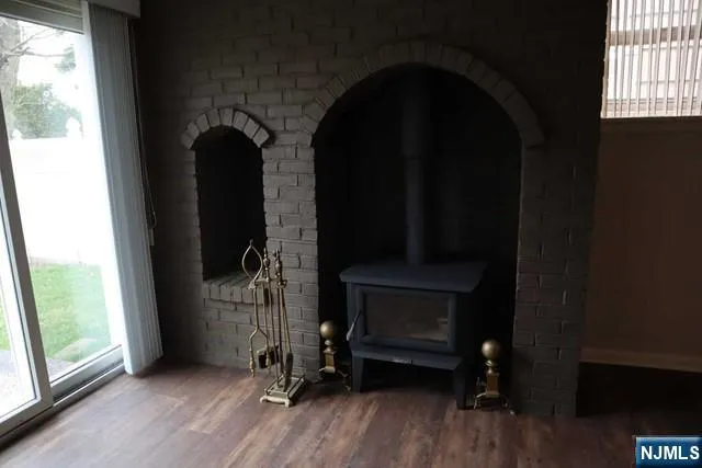 a view of livingroom with furniture wooden floor and window