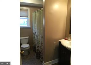 26 Eaves Mill Road Medford, NJ 08055 - Photo 7 of 9 a bathroom with a sink and a toilet