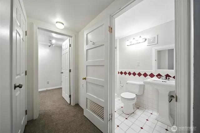 a view of storage and utility room with washer and dryer