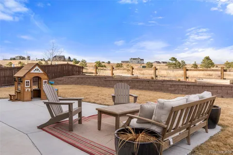 a view of a terrace with sitting area
