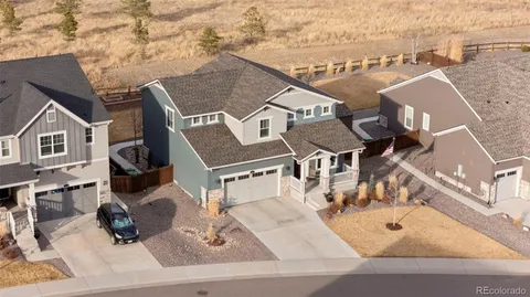 an aerial view of a house with a terrace view