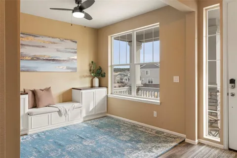 a living room with furniture and a window