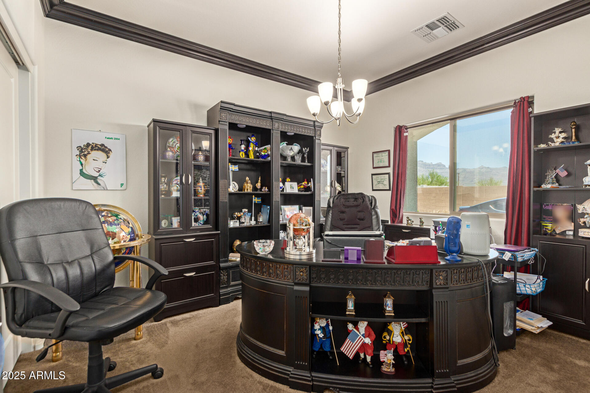 1616 South Aryelle Road Apache Junction, AZ 85119 - Photo 23 of 29 a living room with furniture and a fireplace