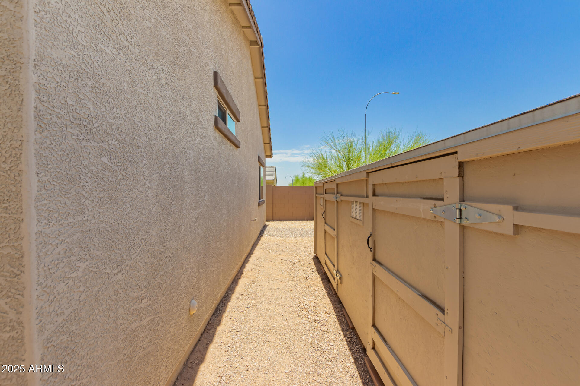 1616 South Aryelle Road Apache Junction, AZ 85119 - Photo 26 of 29 a view of a balcony with wooden floor and cabinet